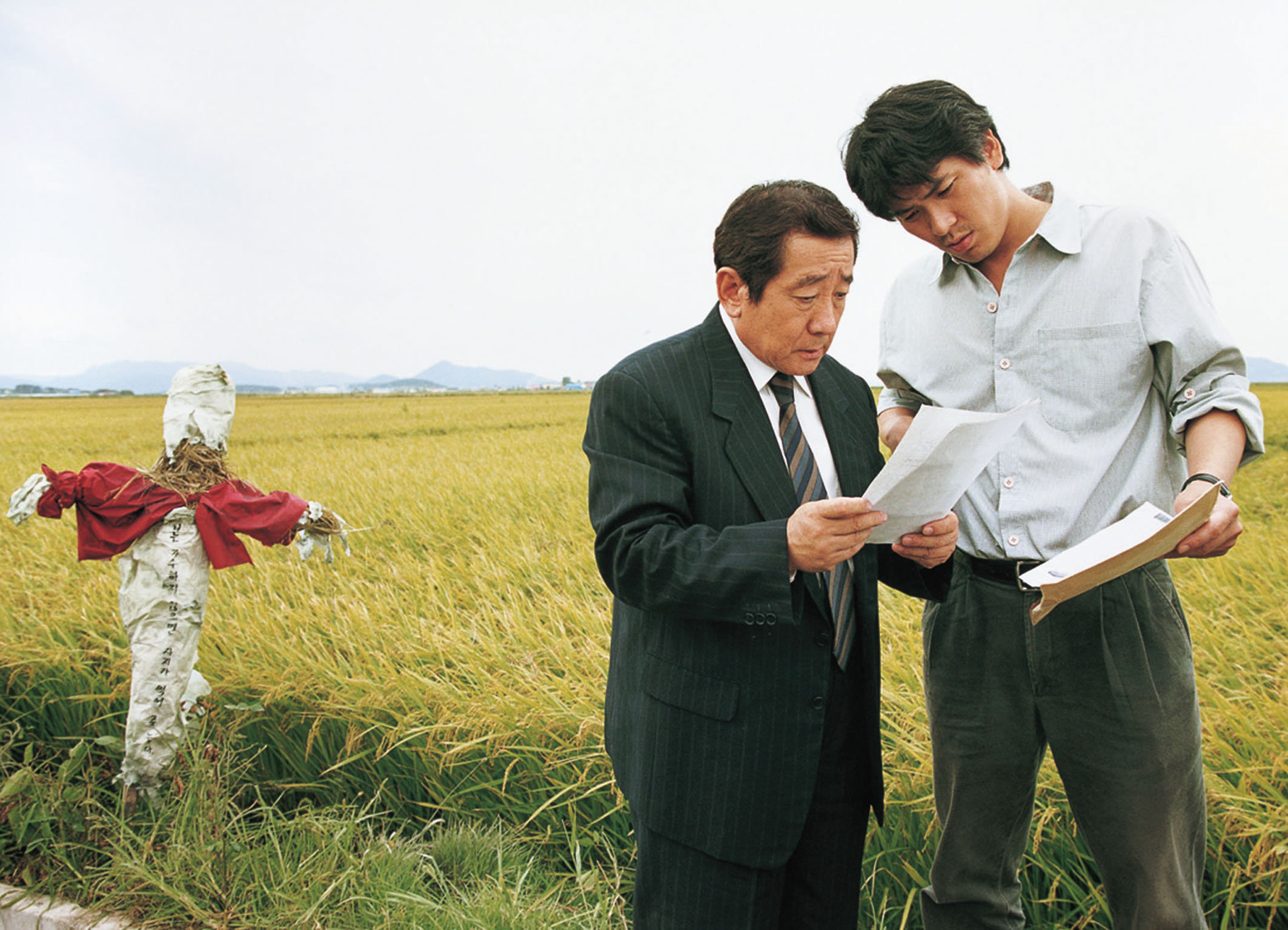 Memories of MurderIndizien: Hee-bong Byeon als Sergeant Koo hee-bong, Sang-kyung Kim als Detective Seo Tae-yoon